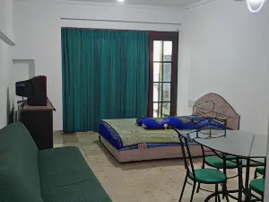 Studio Room at Condominium Selatan Lippo Carita by Ibra