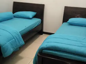 Comfy Room at Honey Guesthouse Syariah