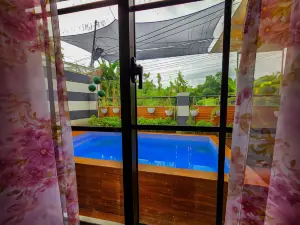 Serene 2Br Escape: Poolside Bliss in Iloilo City