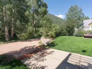 Modern Comfort River/Mtn Views + Hot Tub 1 Bedroom Condo by RedAwning