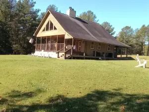 Cozy private cabin on 10 acres with 300+ feet of water front. Pet friendly.