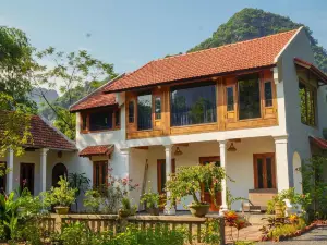 Maison Que