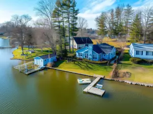 Lakefront Paw Paw Cottage w/ Boats & 2 Docks!