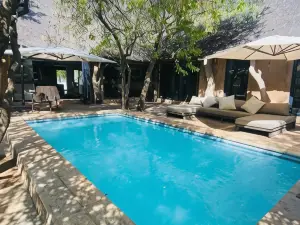 Simba Safaris African Pride Exotic Lodge