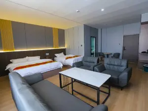 Tumxuk Yixin Business Hotel