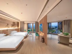 Menghai Boting Hotel (Xishuangbanna Menghai Mengbala International Resort Rainforest Avenue Branch)