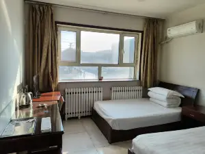 Yumin Songxia Hotel