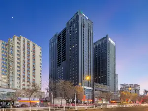 Baishichang Longquan Hotel (Urumqi International Grand Bazamin Street)