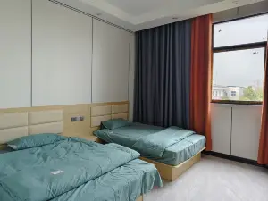 Jiahe Mingzhu Hotel (Zhengyang Handong Town Convenience Service Center)