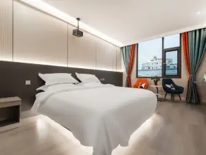 Hejing Film and Television Hotel (Mengzi Wencui Road Min'an Road Branch)