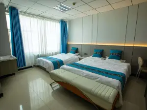 Mangya Colorful Business Hotel (Lenghuzhen)
