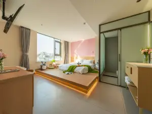 โรงแรมดราก้อนแคทเอลฟ์ (สาขา เล่ยสตรีทไนท์มาร์เก็ตพลาซ่า สถานีรถไฟความเร็วสูงเซาท์ เหอเฟย)