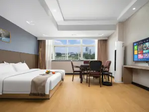 Jinglang Business Hotel (Dengzhou Railway Station)