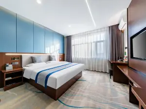 บิสซิเนส โฮเต็ลจินอี้ (สถานีรถไฟความเร็วสูง เฟิงเจิ้น)