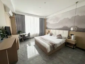 Mangkang Rumei Yijiang Kaiyue Hotel