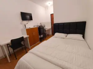 Golden Knight Suites | EcoHome Apartment