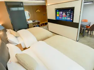 Orange Smart Enjoy Hotel (Guangchang Lotus Plaza)