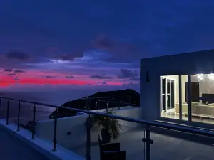 Zafira Luxe 1BR: Sauna, Steam, Sunset Ocean Views