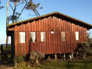 Cabaña en la Playa. Ventanales y Terraza Al Mar