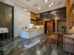 Guiyang Road Mingbuyi Hotel (Huaxi District Government Center Huaxi Park Branch)