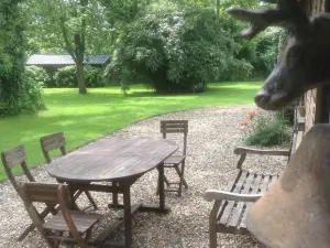 Charmante Petite Maison dans le Jardin