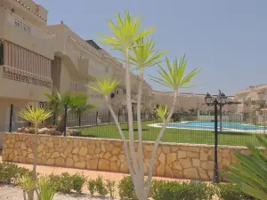 Apartment with 2 Bedrooms in Aguilas, with Wonderful Mountain View, Pool Access and Enclosed Garden