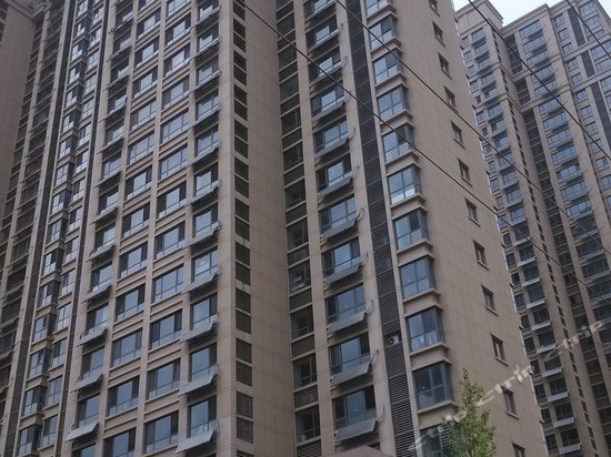 温情家庭旅馆(烟台万象城店)