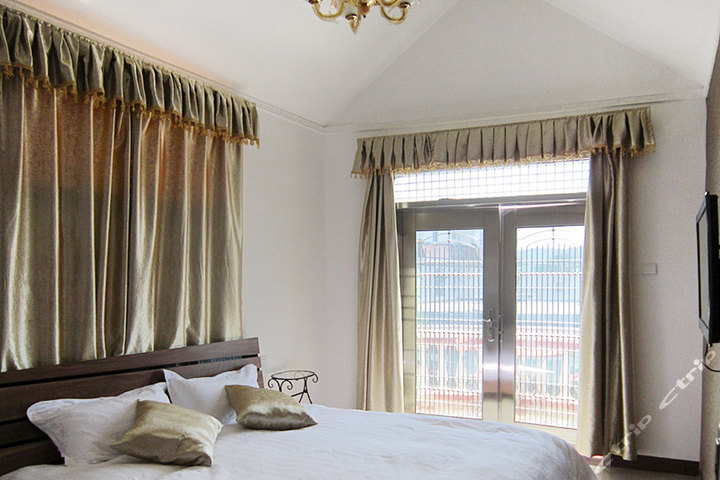 厦门紫色青鸟旅馆(环岛路店)(豪华景观大床房)