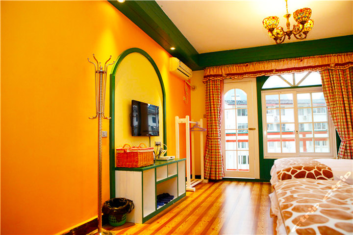 【超值低价】尊享阳朔芒果主题酒店阳台家庭房