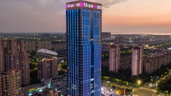 Qingneng Yishang PLUS Hotel (Suzhou Wujiang East Taihu Wanbao Commercial Plaza)
