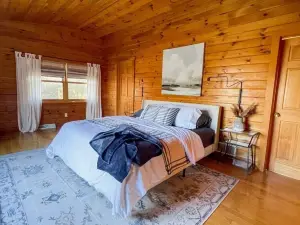 Bring family and friends to this beautiful, spacious, open plan log home.
