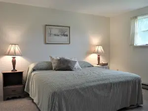 Two Bedroom Across from Outlet Pond on edge of village and wooded trails.