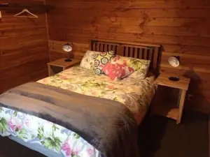 Nestled in the beautiful New Zealand bush a classic Kiwi bach.