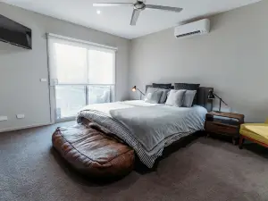 Relax & watch magical sunsets upstairs balconies overlooking the beautiful lake