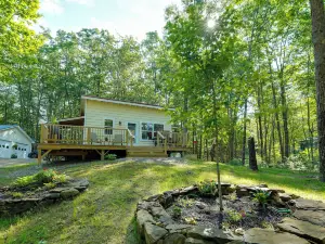 Private Dock & Deck: Tranquil Dam Pond Cottage!