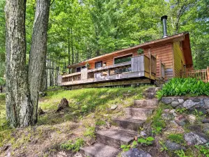 Burns Lake Cabin w/ Dock, Fire Pit, Rowboat & More
