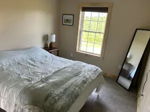 NEW Cozy Cabin located in Oakland tucked away in a peaceful wooded scene.
