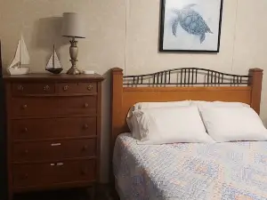 Cottage located in a local fish camp with boat parking.