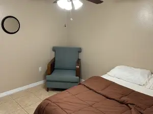 A cozy room with double bed in semi shared Flat