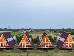 Alaya Stays Malik Farms Wooden Cottages