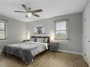 Picture perfect modern farmhouse getaway on enchanting 7 acres in Holt
