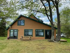 "The Dam House" Lake and River Front Home with Beautiful Sunset Views