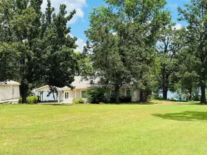 Lakeside Cabin with Beautiful Lake View, Hot Tub, and .5 mi from Beach & Marina