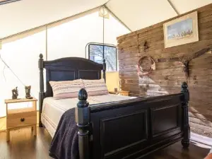 Settle into a Cozy Old West Cabin Tent Escape
