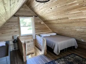Magnificent Cabin Nestled Amidst Trees in Portage Lake, Maine