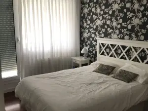 a cozy and charming pennhouse with a wonderful view