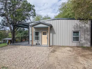 Tranquil Lake Escape with Large Deck and Outdoor Shower - Charming Getaway