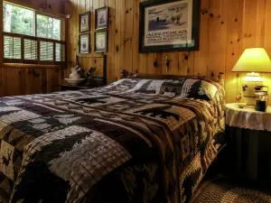 Cozy Cottage Surrounded by Trees with Private Dock for a Peaceful Escape by Big Moose Lake in New Yo