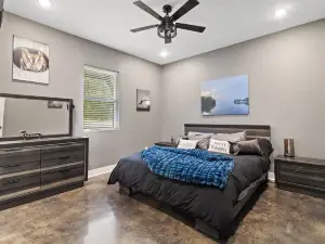 Richland Chambers Lakefront 2-story home with boat dock and pavilions.