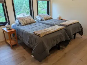 Contemporary house on 8 acres of wild flowers, trees and trails; pet friendly